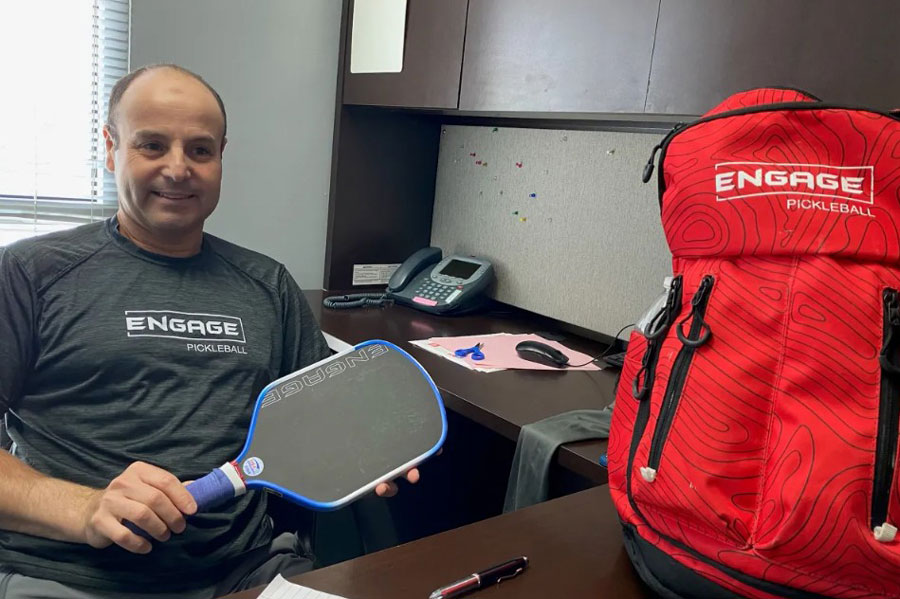 Former Radford tennis star Youssef Bouzidi in his office