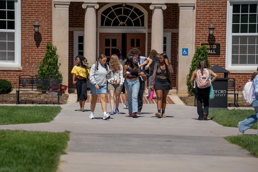 Students emerge from Reed Hall on Radford University's campus.