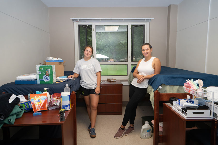 Two freshmen arrange their new dorm room on a Move-in Day 2026.