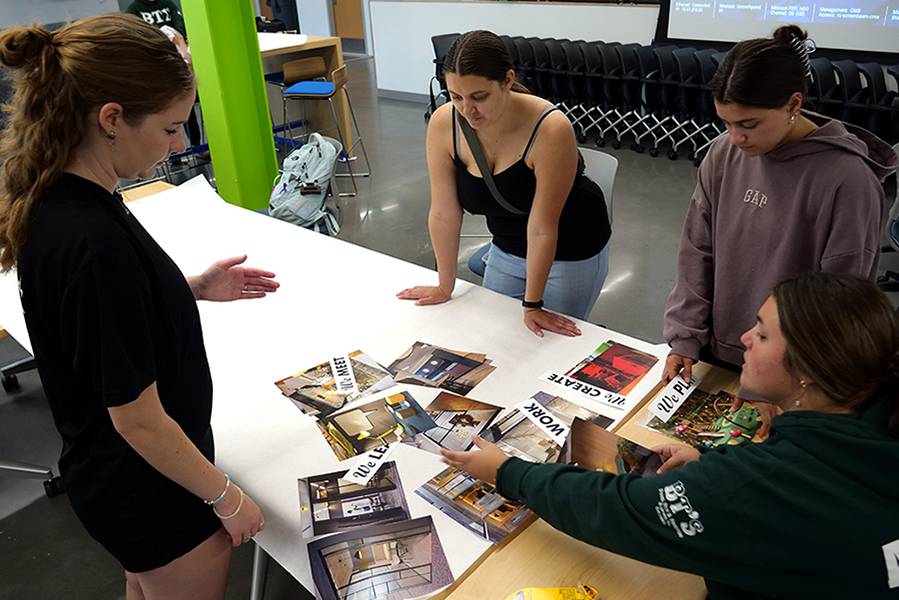 Students work on a proposal for a vacant building in downtown Radford.