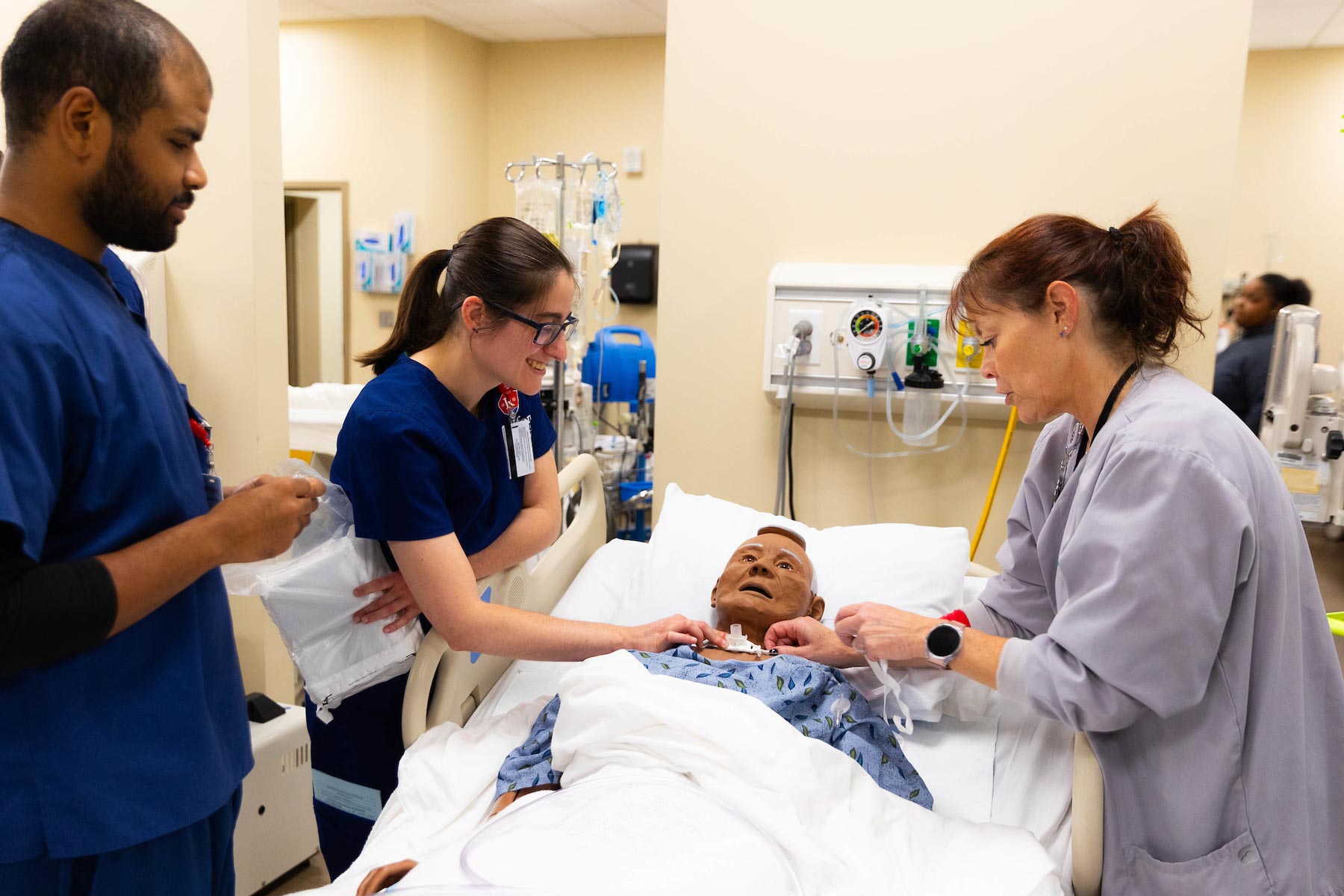 students working in the clinical simulation center
