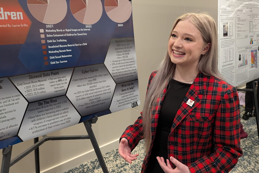 student Lauren Griffen presenting research